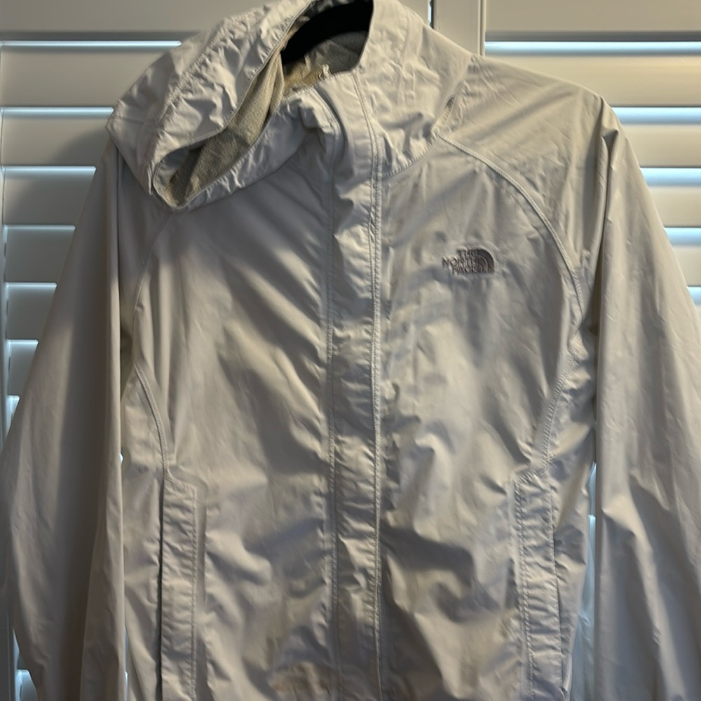 The North Face white zip rain jacket